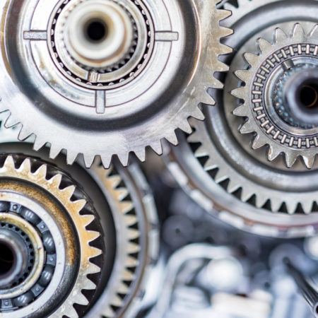 Planetary gearsets inside vehicle automatic transmission. Close up view in mechanic workshop during repairing